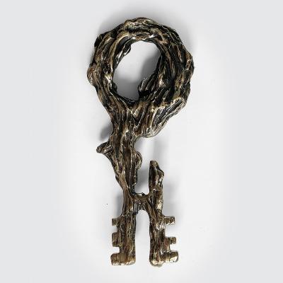 William Guillon WHERE EVERYTHING ENDS WHERE EVERYTHING BEGINS Sculptural bronze key 1