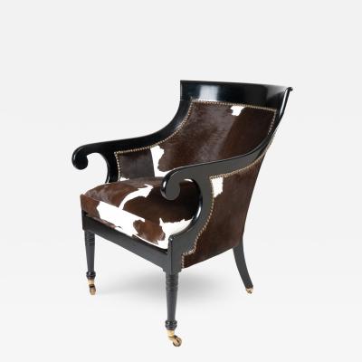 William IV ebonized mahogany framed gondola arm chair in calfskin