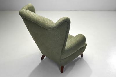 Wingback Armchair Upholstered in Dark Green Europe Mid 20th Century