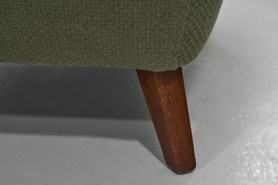 Wingback Armchair Upholstered in Dark Green Europe Mid 20th Century