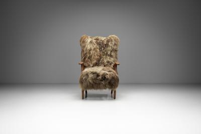 Wingback Armchair in Brown Longhair Sheepskin Denmark 1960s