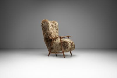 Wingback Armchair in Brown Longhair Sheepskin Denmark 1960s