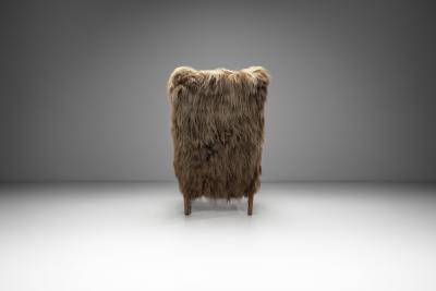 Wingback Armchair in Brown Longhair Sheepskin Denmark 1960s