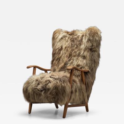 Wingback Armchair in Brown Longhair Sheepskin Denmark 1960s