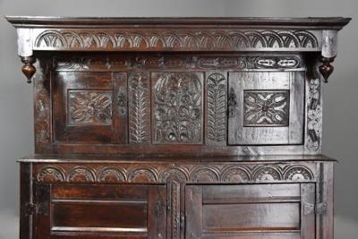 Wonderful mid 17thc carved oak press cupboard with superb patina