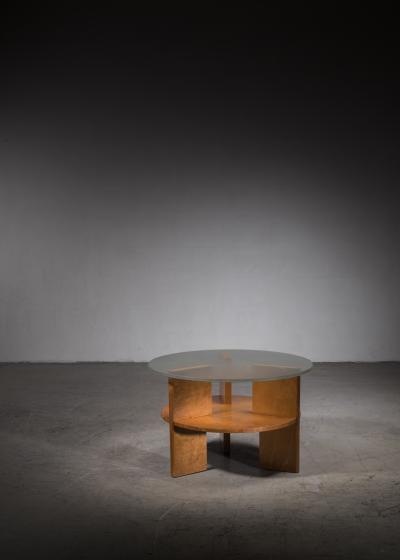 Wood coffee table with glass top