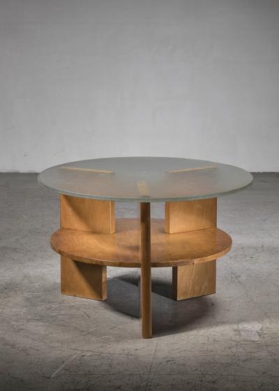 Wood coffee table with glass top