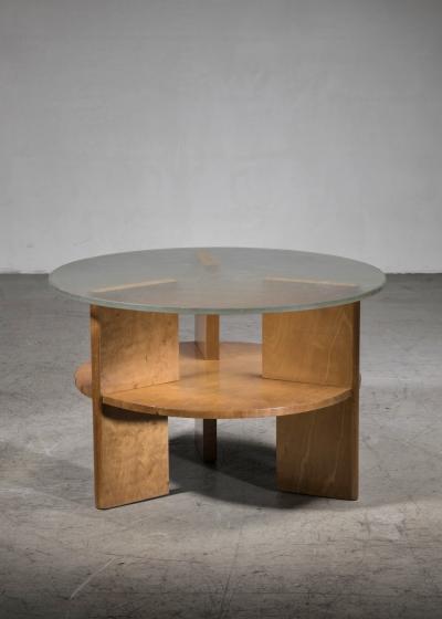 Wood coffee table with glass top