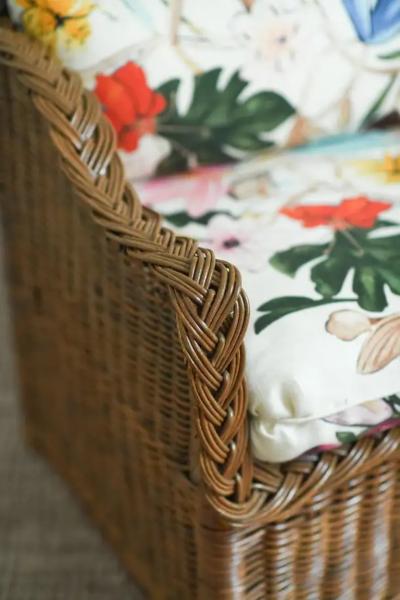 Woven rattan sofa with dedar fabric cushions