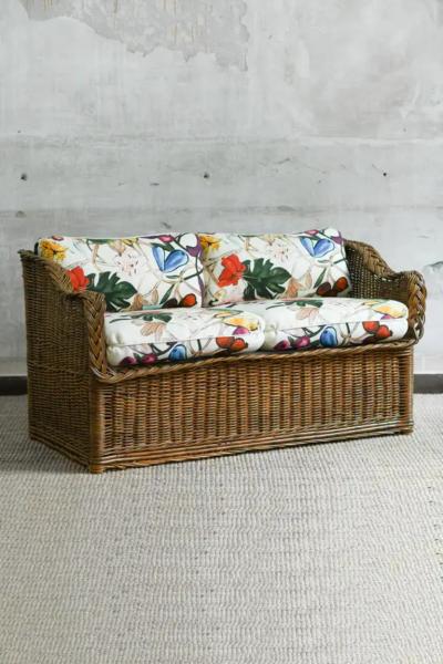 Woven rattan sofa with dedar fabric cushions