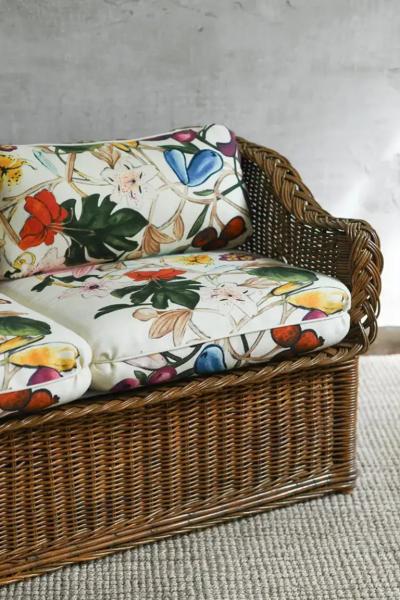 Woven rattan sofa with dedar fabric cushions