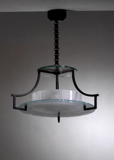 Wrought iron and glass lamp