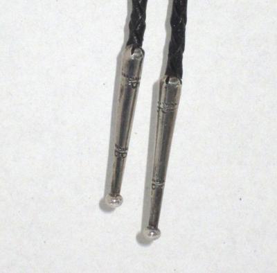 Zuni bolo with knifewing god slide and silver dangles