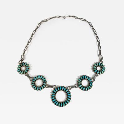 Zuni necklace with graduated circles done in needlepoint technique
