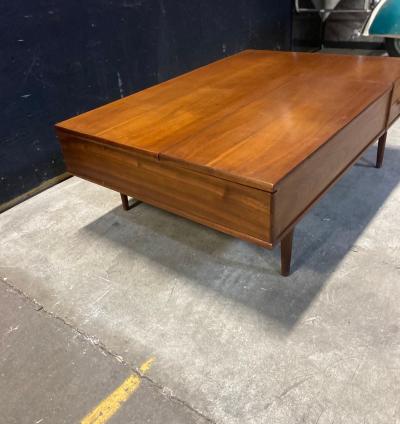 a Lovely Walnut coffee Table by Kip Stewart for the Drexel Declaration Group