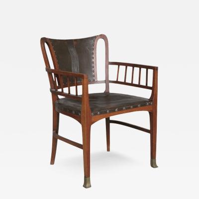 c1910 German Art Nouveau sculpted walnut leather armchair