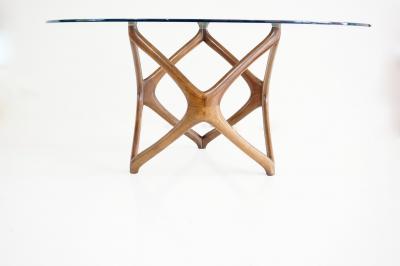 pierluigi Giordani Pierluigi Giordani round coffee table carved wood and crystal top 1950