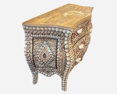 urved chest of drawers made from seashells France circa 1990