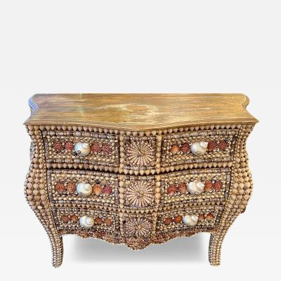 urved chest of drawers made from seashells France circa 1990