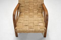  Adrien Audoux Frida Minet A Pair of Woven Rope Armchairs by Audoux Minet France ca 1950s - 4008312