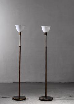  B hlmarks AB Bohlmarks Bohlmarks pair of brass and leather floor lamps - 2223503