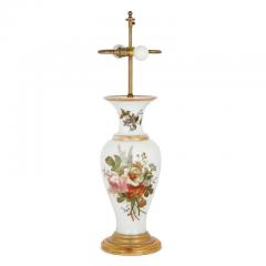  Baccarat A Baccarat opaline glass lamp vase formed with floral decoration - 2981979