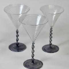 Lot - A GROUP OF FIVE BIMINI WERKSTATTE ART GLASS LAMPWORK FIGURAL MARTINI  GLASSES, VIENNA, AUSTRIA, CIRCA 1925-1938