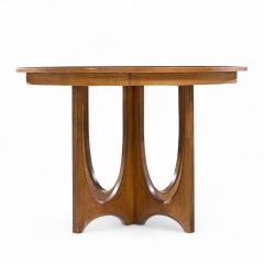 Broyhill Brasilia Broyhill Brasilia Mid Century Walnut Round Expanding Dining Table with 2 Leaves - 4387402
