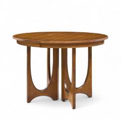  Broyhill Brasilia Broyhill Brasilia Mid Century Walnut Round Expanding Dining Table with 2 Leaves - 4387405