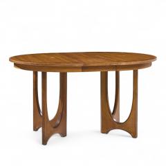  Broyhill Brasilia Broyhill Brasilia Mid Century Walnut Round Expanding Dining Table with 2 Leaves - 4387407