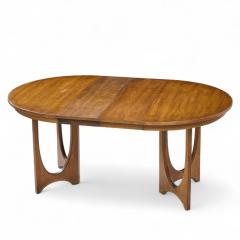  Broyhill Brasilia Broyhill Brasilia Mid Century Walnut Round Expanding Dining Table with 2 Leaves - 4387408
