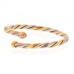  Cartier CARTIER 18K YELLOW GOLD TRI COLOR TWIST BANGLE WITH CORAL TIPS BRACELET - 2997062