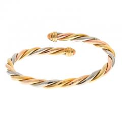  Cartier CARTIER 18K YELLOW GOLD TRI COLOR TWIST BANGLE WITH CORAL TIPS BRACELET - 2997063