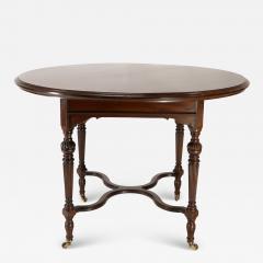  Collinson Lock Collinson Lock attributed An Aesthetic Movement walnut circular center table - 4233005