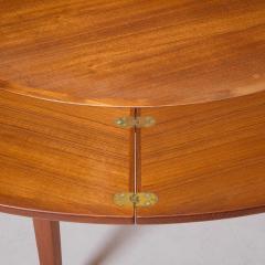  Dyrlund Danish Teak Circular Expanding Flip Flap Dining Table by Dyrlund Furniture - 4774635