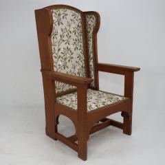  E G Punnett E G Punnet attributed Probably made by William Birch An oak wing back armchair - 4191650