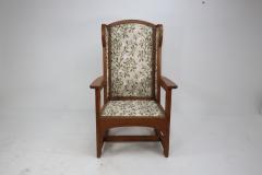  E G Punnett E G Punnet attributed Probably made by William Birch An oak wing back armchair - 4191651