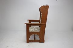  E G Punnett E G Punnet attributed Probably made by William Birch An oak wing back armchair - 4191653