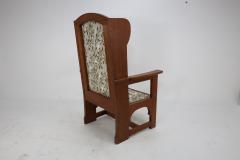  E G Punnett E G Punnet attributed Probably made by William Birch An oak wing back armchair - 4191655
