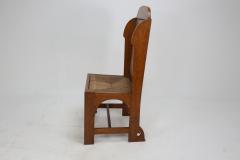  E G Punnett E G Punnett attributed Probably Made by William Birch An Oak Wing Back Chair - 4191660