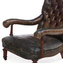  Gillows of Lancaster London An English Walnut and Tufted Leather Library Armchair by Gillows 19th C  - 4428434