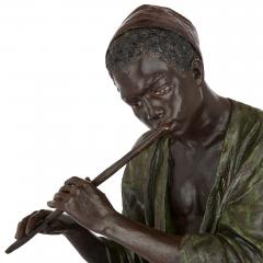  Goldscheider of Vienna A large painted terracotta figure of a boy playing the flute by Goldscheider - 2898216