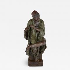  Goldscheider of Vienna A large painted terracotta figure of a boy playing the flute by Goldscheider - 2902347