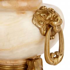  H Journet Cie Two gilt bronze mounted enamelled onyx urns by H Journet Cie - 1290501