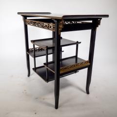  Heal s Heals Heal Son Ltd Heals An Anglo Japanese Ebonised Side Table with Gilt Fretwork Flaring Ends - 4183265