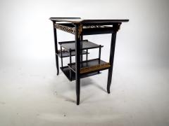  Heal s Heals Heal Son Ltd Heals An Anglo Japanese Ebonised Side Table with Gilt Fretwork Flaring Ends - 4183269