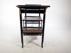  Heal s Heals Heal Son Ltd Heals An Anglo Japanese Ebonised Side Table with Gilt Fretwork Flaring Ends - 4183270