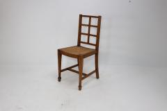  Heal s Heals Heal Son Ltd Heals of London attributed An Arts Crafts Oak Lattice Back Side Chair - 4191822