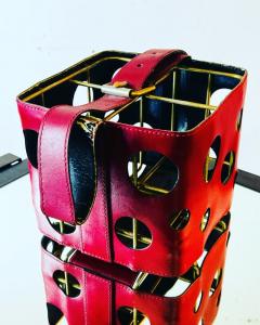  Herm s MODERNIST FRENCH RED PLEATHER AND BRASS WINE HOLDER IN THE STYLE OF HERMES - 2822184