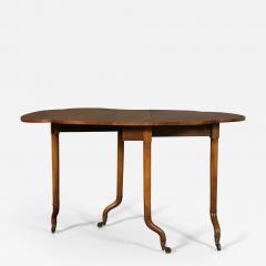  Holland Sons An Unususal Walnut Gateleg Table by Holland Sons - 565637